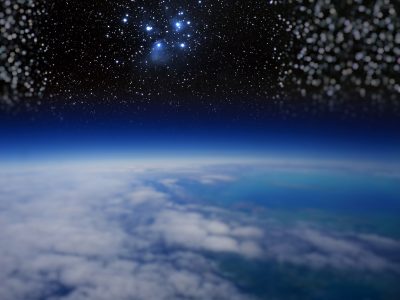 High altitude view of the Earth in space and the Pleiades.